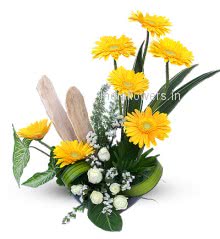 Arrangment of Yellow Gerberas and White Roses to India
