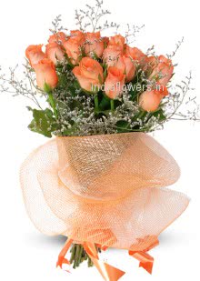 Flower Bunch of 20 Valentine Orange Roses wrapped in net and ribbon to Shimla