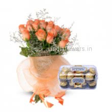 Bunch of 20 Orange Roses. 16 pc Ferroro Rocher Chocolate to India