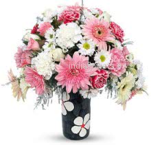 Mixed Flowers in Pinkish in a Simple Glass Vase a wonderful gift. 20 Pink and White Gerberas, 20 Pink and White Carnation and 20 White and Pink Roses