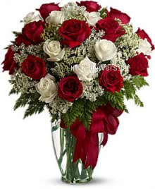 Valentine Red and White Roses in a clear glass Vase decorated beautifully. 30 Red and White 