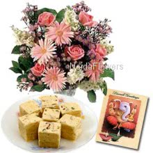 Hamper includes pack of 500gm sone papri sweet with bunch of 10 mixed seasonal flowers and a diwali greeting card.