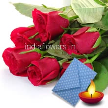 Bunch of 10 red roses nicely wrapped with seasonal fillers and deepawali greeting card.