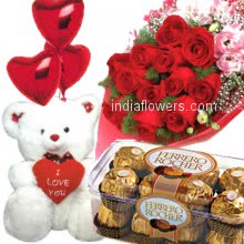 Bunch of 12 red roses nicely decorated with 16pc Ferroro Rocher Chocolate and 6 inch teddy with balloons 