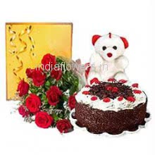Bunch of 12 Red Roses, Half Kg. Black Forest Cake, 6 Inch Teddy and Small Cadbury Celebration