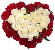 Hart Shape Arrangement of 25 White and 25 Red Roses nicely decorated with fillers and greens