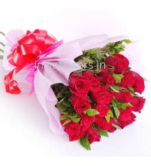 Bunch of 20 Red Roses nicely decorated with filler ribbons and Pink Paper Packing, instantly spread love and smiles to your loved ones