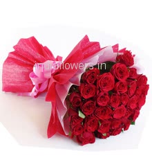 Bunch of 50 Red Roses nicely decorated with fillers and ribbons packed with exclusive paper packing
