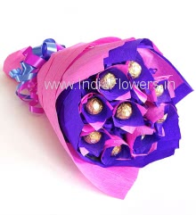 Yummy Chocolate Bouquet of 10pc Ferrero Rocher Chocolates nicely packed with color paper packing and ribbons