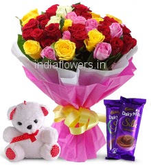 Bunch of 30 Mixed Color Roses nicely decorated with fillers and ribbons and paper packing, with 6 Inch Teddy and 2pc Cadbury Dairy Milk Silk of Rs. 60 each.