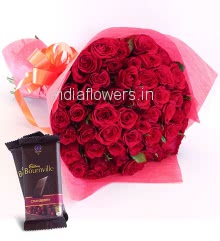 Roses Hand Bouquet of 45 Roses nicely decorated with fillers ribbons and Paper Packing, with 2pc Cadbury Bournville Chocolates of Rs.80 each