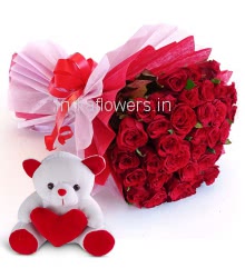 Beautiful Hand Bouquet of 60 Red Roses nicely decorated with fillers Ribbons packed with Paper Packing and 6 Inch Teddy.