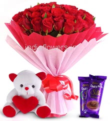Romantic Bouquet of Stunning 40 Red Roses nicely decorated with fillers Ribbons and Paper Packing, with 6 Inch Teddy and 2pc Cadbury Silk Chocolate of Rs. 60 each.