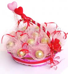 Basket of 13pc Ferrero Rocher Chocolates nicely decorated with Net packing and ribbons