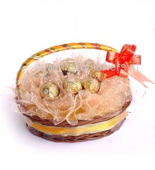 Chocolate Basket of 13pc Ferrero Rocher nicely packed with net packing and ribbons