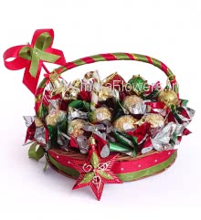 Basket of 16 Ferrero Rocher decorated with christmas ornaments and packed with metallic cellophane and ribbons