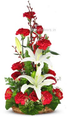 Arrangement 10 of Red Roses 10 Red Carnation and 2 White Lilies nicely decorated with Fillers and Greens. Please note we may substitute type of flowers / color of flowers in case of unavailability.