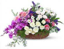 Basket of Mixed Multicolor Flowers Roses Orchid Gerbera Carnation and fillers