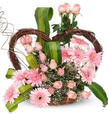Arrangement of Pink Roses and Pink Gerberas nicely decorated with fillers and greens. Please note wooden structure not included.