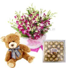 For your innocent love a beautyful Bunch of 10 Orchids and 24 pc Ferroro Rocher Chocolates with 12 inches cute Teddy